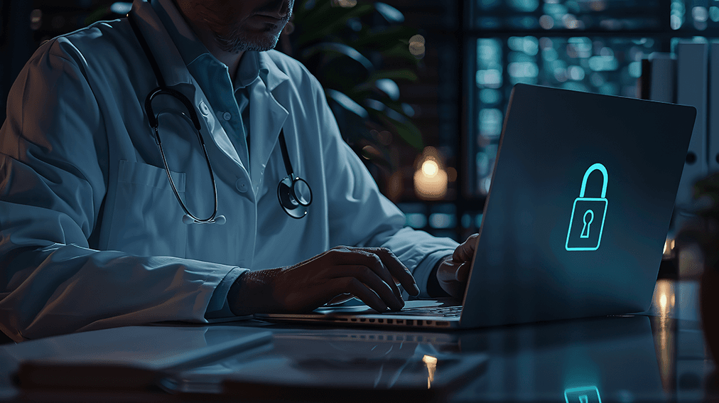 Doctor typing on a computer